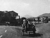 1962 - L'INCROCIO DI VIA TAVERNA,DAVANTI LA MACELLERIA, CON UN CARRETTO DELL'EPOCA