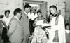 1962 - IL BATTESIMO DELLA NOSTRA PRESIDENTE ANNAMARIA MORELLI CON DON VINCENZO D'AGOSTINO NELLA CHIESETTA DI VIA TAVERNA DOVE VENIVA OFFICIATA LA MESSA PRIMA DI COMPLETARE LA CHIESA MARIA AUSILIATRICE