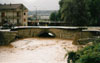 1993 - L'ALLUVIONE CHE COLPI' IL NOSTRO PAESE. NELLA FOTO LA GRANDE QUANTITA' DI ACQUA DEL TORRENTE RAVA SOTTO IL PONTE DELLA STATALE CROLLATO.